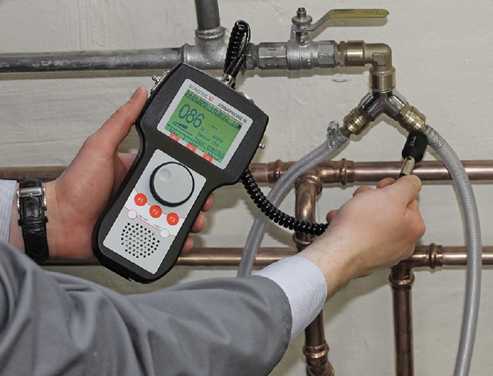 Plumber testing pipes with electronic leak detection equipment in San Ramon